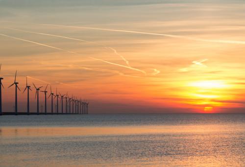 Offshore wind turbines during a beautiful sunset
